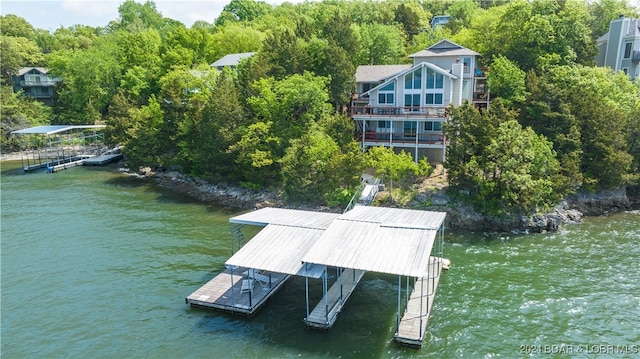 dock area with a water view