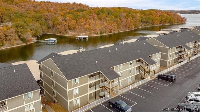 611 Lazy Days Rd Unit X11, Osage Beach, MO 65065 - birds eye view of property featuring a water view and a wooded view