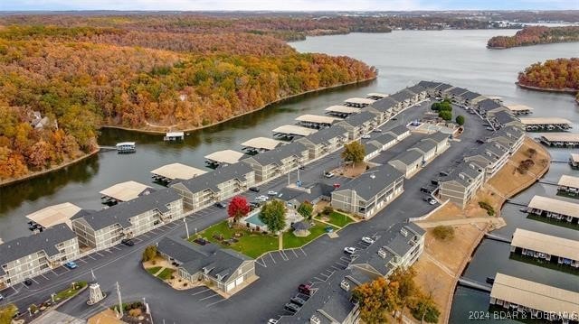 611 Lazy Days Rd Unit X11, Osage Beach, MO 65065 - birds eye view of property featuring a water view and a forest view