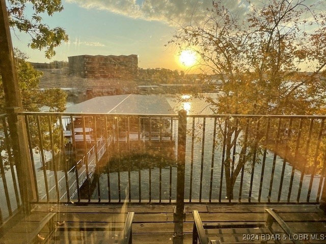 view of balcony at dusk