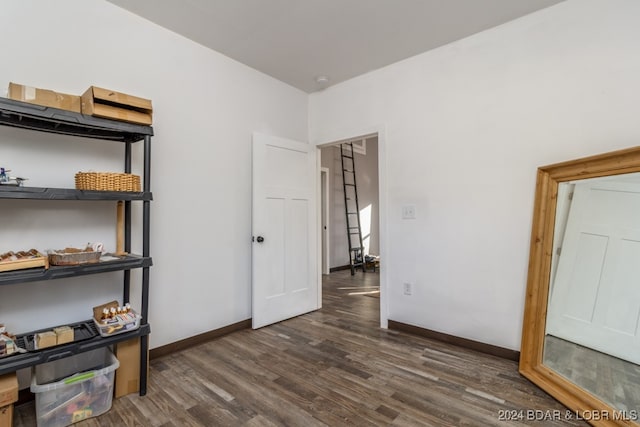 interior space featuring dark wood-type flooring