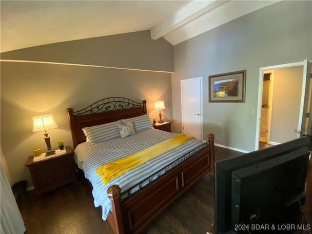 bedroom featuring dark wood-type flooring and vaulted ceiling with beams