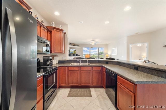 kitchen featuring ceiling fan, sink, kitchen peninsula, light tile patterned flooring, and black appliances