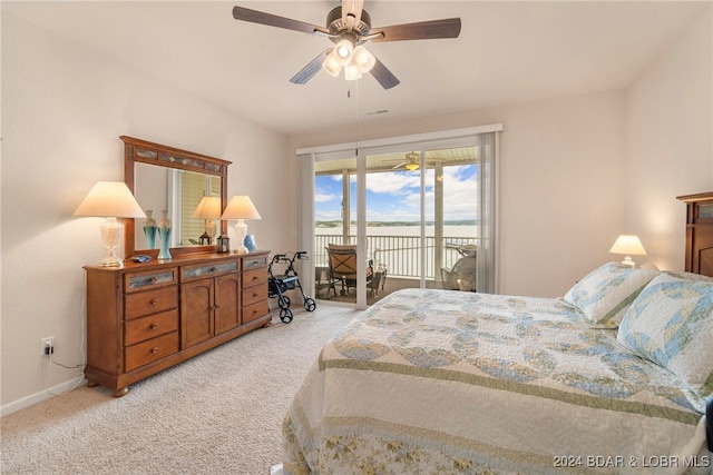 carpeted bedroom with access to exterior and ceiling fan