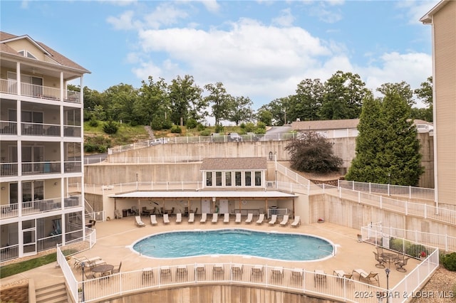 view of pool with a patio