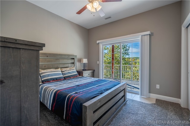 bedroom featuring access to exterior, light colored carpet, and ceiling fan