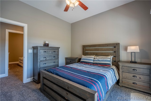 bedroom featuring lofted ceiling, carpet, and ceiling fan