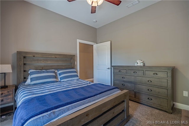 bedroom with ceiling fan and carpet flooring