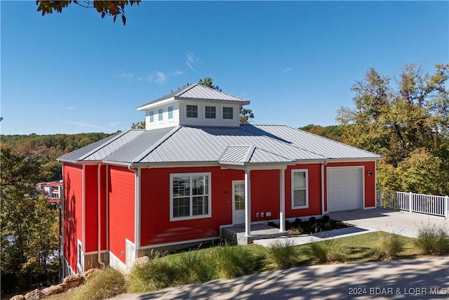 view of front of property featuring a garage