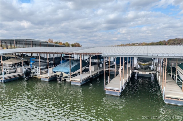 dock area featuring a water view