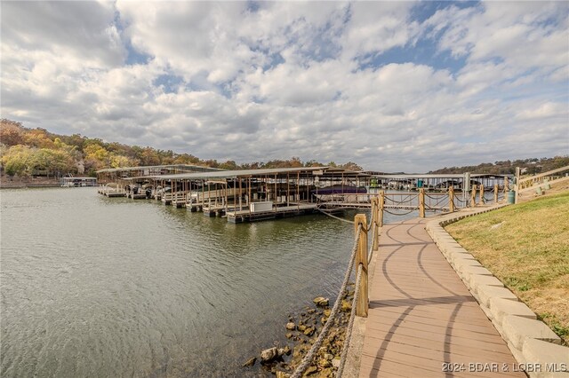 dock area with a water view