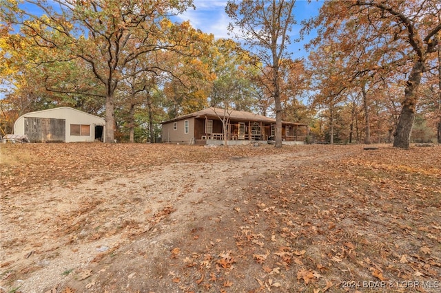 exterior space featuring an outdoor structure