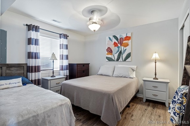 bedroom featuring a closet, ceiling fan, and hardwood / wood-style flooring