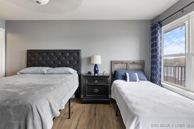 bedroom featuring wood-type flooring