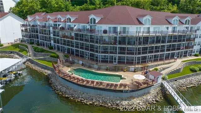 view of building exterior with a water view