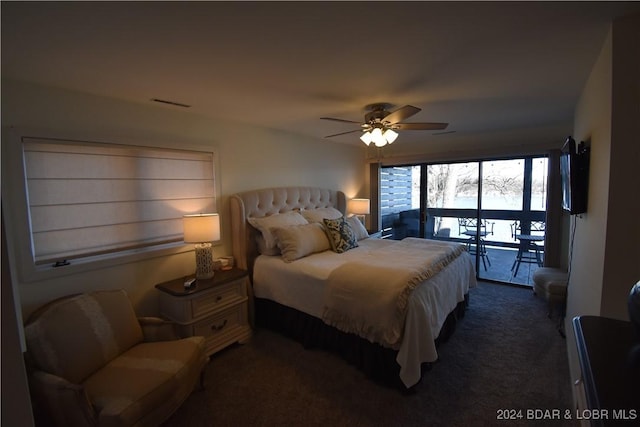 carpeted bedroom with ceiling fan and access to exterior