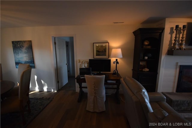 living room featuring dark hardwood / wood-style floors