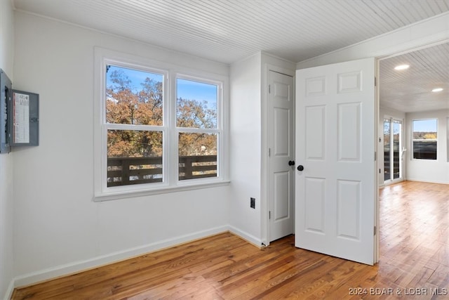 spare room with hardwood / wood-style flooring