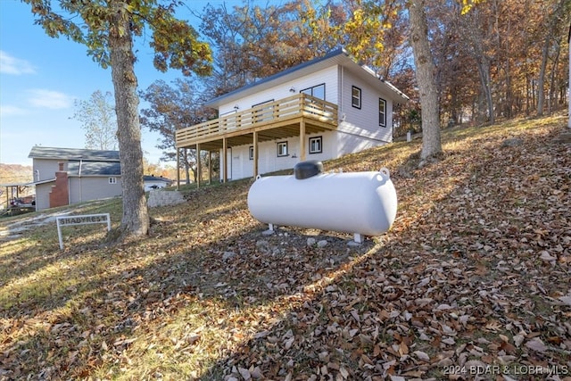 view of side of home featuring a deck