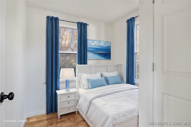 bedroom featuring parquet floors