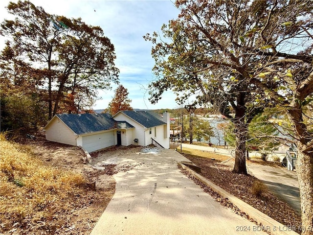 view of side of property with a garage