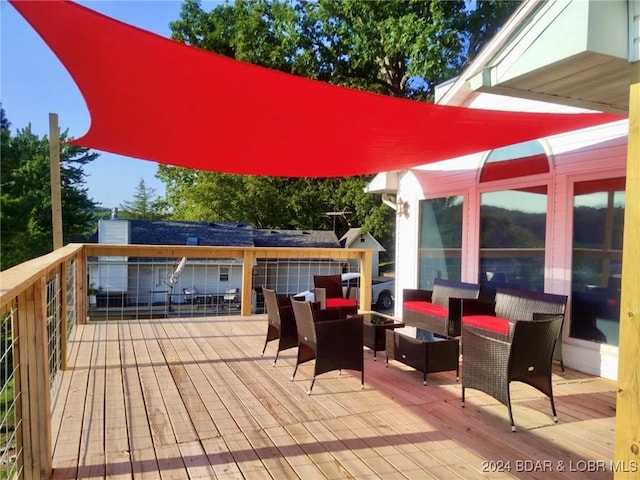 deck with an outdoor living space