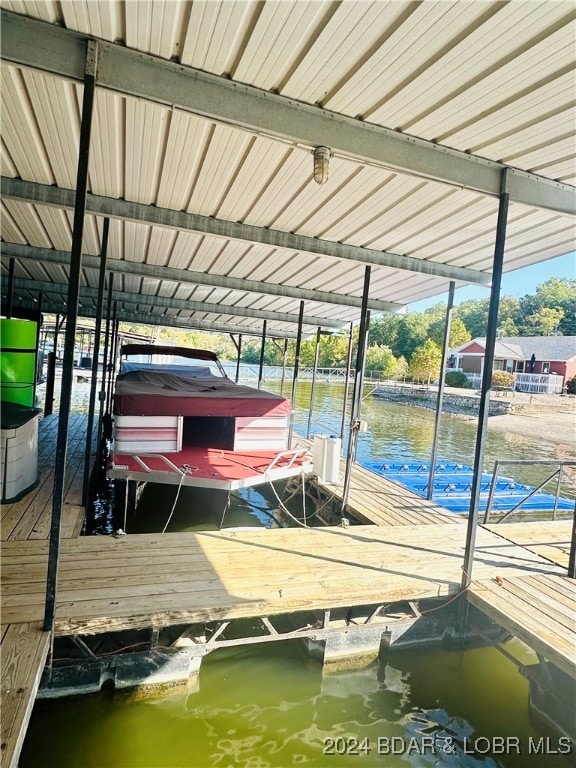 dock area featuring a water view