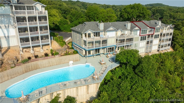 view of swimming pool with a patio