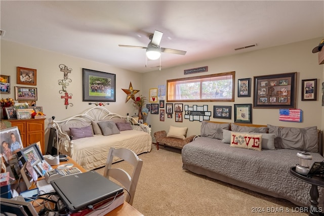 carpeted bedroom with ceiling fan