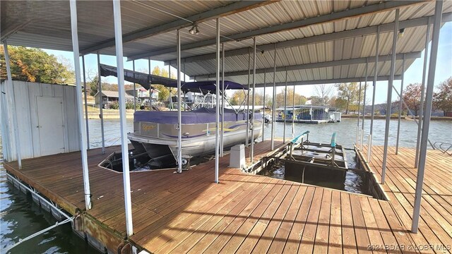 view of dock with a water view