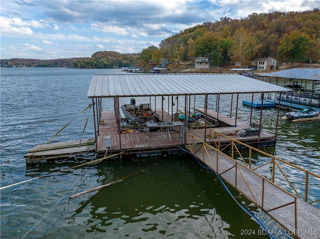 view of dock with a water view