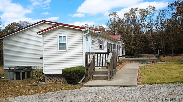 view of property exterior featuring a yard