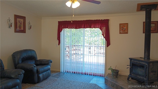 tiled living room with ornamental molding, a textured ceiling, and a wood stove