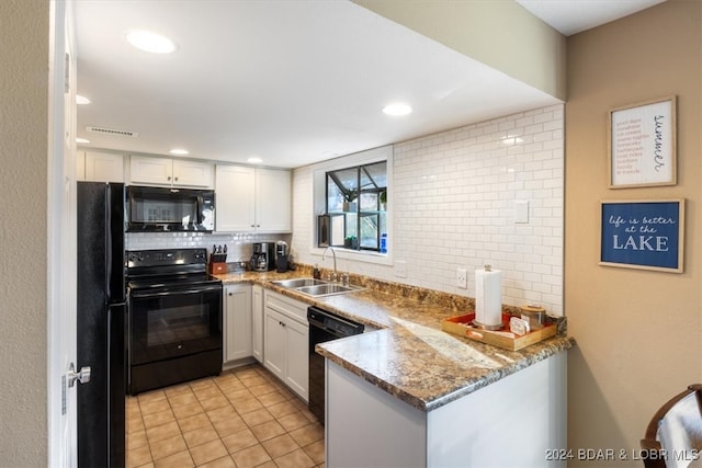 kitchen featuring sink, black appliances, white cabinets, and kitchen peninsula