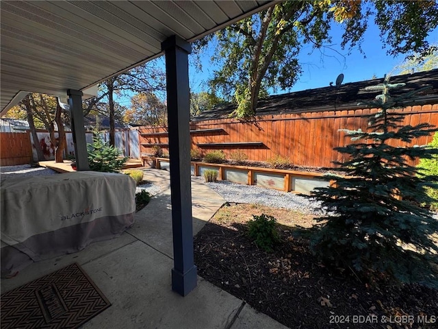 view of patio featuring a fenced backyard
