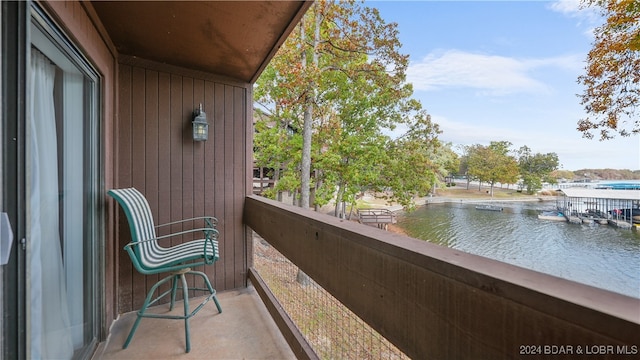 balcony featuring a water view