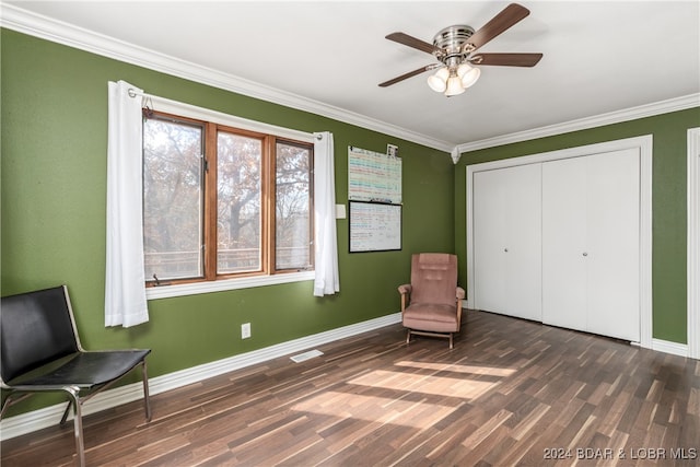 unfurnished room featuring ceiling fan, ornamental molding, and dark hardwood / wood-style flooring