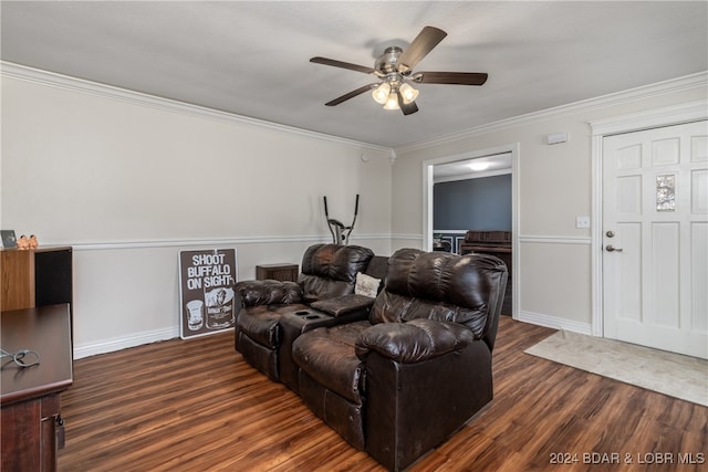 living room featuring ornamental molding, dark wood-type flooring, and ceiling fan