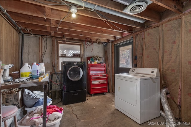 laundry room with washer and dryer