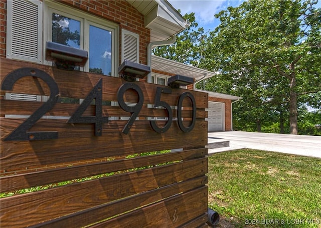24950 State Rd A Rd, Richland, MO 65556 - wooden deck with concrete driveway