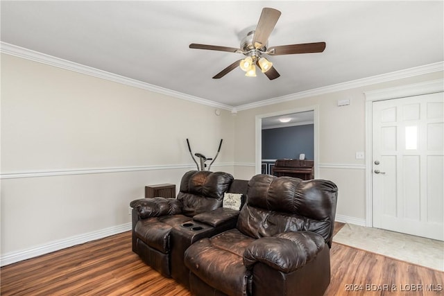 24950 State Rd A Rd, Richland, MO 65556 - living area with wood finished floors, a ceiling fan, and crown molding