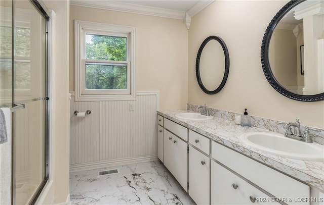 24950 State Rd A Rd, Richland, MO 65556 - bathroom with marble finish floors, double vanity, ornamental molding, a wainscoted wall, and an enclosed shower