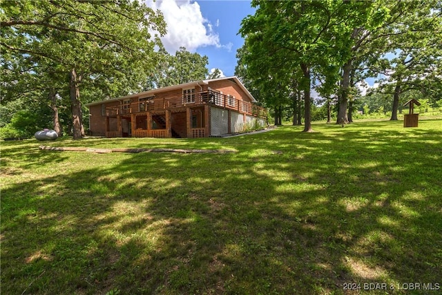 24950 State Rd A Rd, Richland, MO 65556 - view of grassy yard with a wooden deck