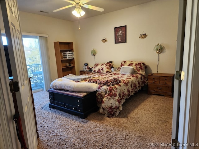 bedroom with carpet, access to outside, and ceiling fan