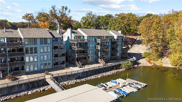 bird's eye view with a water view