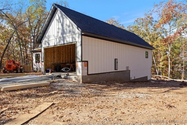 view of property exterior featuring an outdoor structure