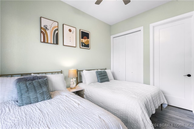 bedroom featuring ceiling fan and dark hardwood / wood-style floors