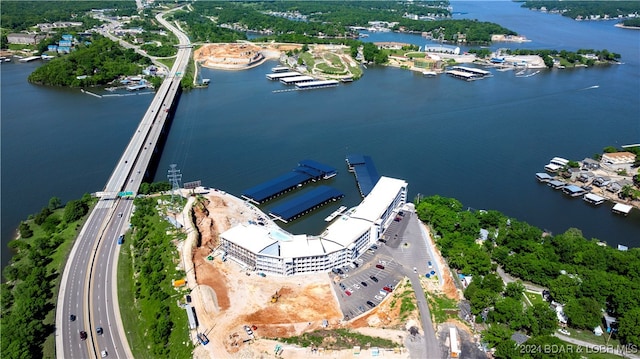 birds eye view of property featuring a water view