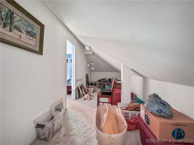 bonus room featuring lofted ceiling