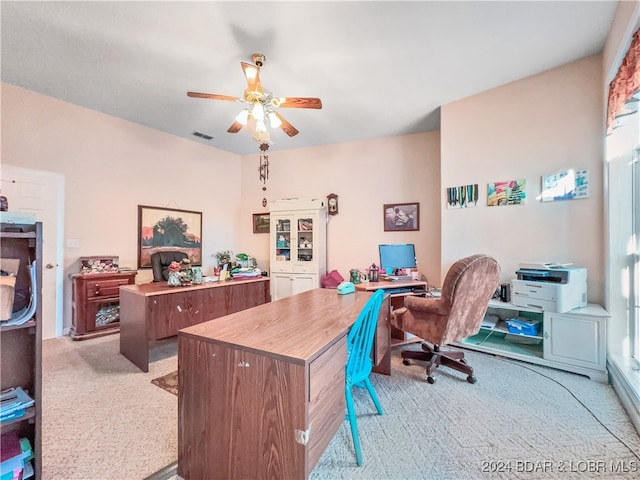 office with light colored carpet and ceiling fan